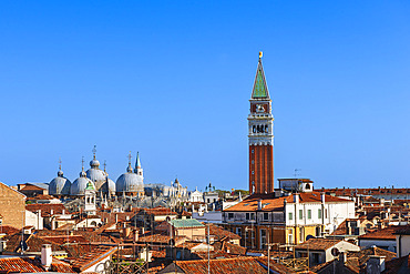 View of the City of Venice with the Campanile di San Marco (St Mark's Campanile) and St Mark's Basilica (Basilica di San Marco) standing out among the red clay rooftops, Venice, Veneto, Italy