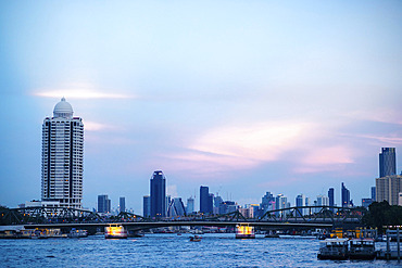 View of Bangkok at dusk along the Chao Phraya River in Thailand, Bangkok, Bangkok, Thailand