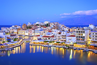 Agios Nikolaos Harbour from an elevated angle at dusk, Agios Nikolaos, Crete, Greek Islands, Greece, Europe