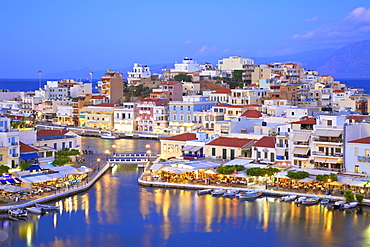 Agios Nikolaos Harbour from an elevated angle at dusk, Agios Nikolaos, Crete, Greek Islands, Greece, Europe