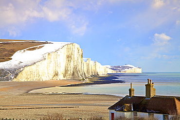 Snow on The Seven Sisters and Coastguard Cottages, Seaford Head, South Downs National Park, East Sussex, England, United Kingdom, Europe