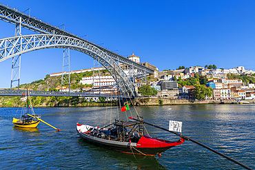 Rabelo Boats on the River Douro with the Dom Luis l Bridge, Porto, Portugal, Southern Europe