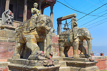 Ganesh Shrine, Uma Maheshwar Temple guarded by two stone elephants, Kirtipur, Nepal, Asia