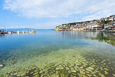 Ohrid old city reflected in the marina, Ohrid, UNESCO World Heritage Site, Macedonia, Europe