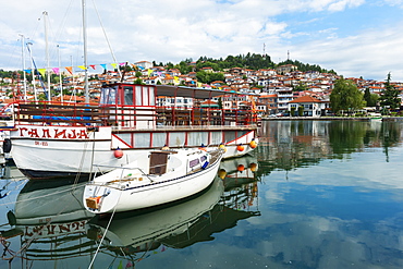 Boats reflecting on Ohrid Lake, Ohrid, UNESCO World Heritage Site, Macedonia, Europe