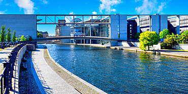 Paul-Loebe Parliament building along the Spree River and footbridge, Government district in Berlin Mitte, Berlin, Germany, Europe