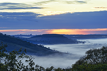 Early morning fog over valleys and mountains, Serra da Canastra, Minas Gerais state, Brazil, South America