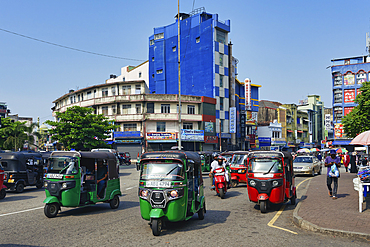 Motorized tuk tuk in a shopping street, Colombo, Sri Lanka