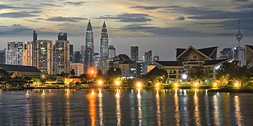 Titiwangsa Lake Garden and Kuala Lumpur city skyline at dawn, Malaysia, Asia