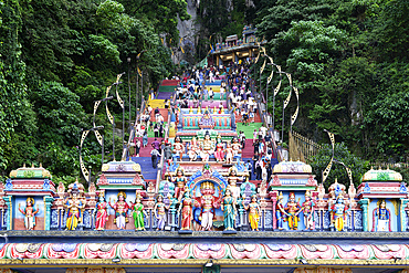 Colorful staircase leading to the caves with many pilgrims, Batu Caves complex, Kuala Lumpur, Malaysia, Asia