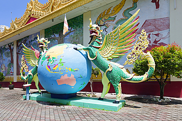 Dhammikarama Burmese Buddhist Temple, Garden decorated with statues, George Town, Penang, Malaysia