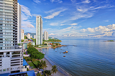 Penang skyline and beach on the Malacca Straits, Penang, Malaysia