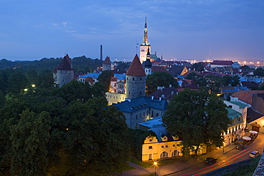 Elevated view of lower Old Town with Oleviste Church in the background, UNESCO World Heritage Site, Tallinn, Estonia, Europe