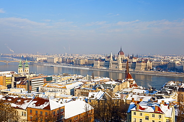 Hungarian Parliament illuminated by warm light on a winters afternoon, Budapest, Hungary, Europe