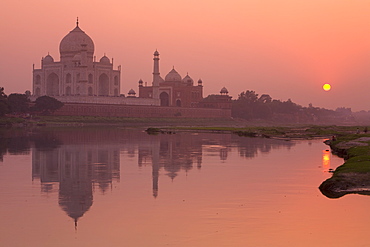 Taj Mahal reflected in the Yamuna River at sunset, UNESCO World Heritage Site, Agra, Uttar Pradesh, India, Asia 