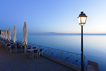 Street cafe on a promenade at sunset, Meersburg, Lake Constance (Bodensee), Baden Wurttemberg, Germany, Europe 