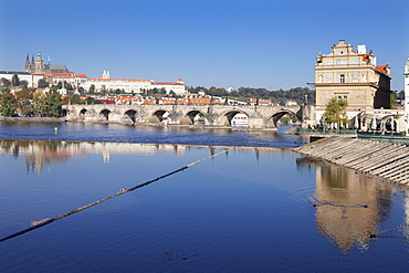 View over the River Vltava to Smetana Museum, Charles Bridge and the Castle District with St Vitus Cathedral and Royal Palace, UNESCO World Heritage Site, Prague, Bohemia, Czech Republic, Europe