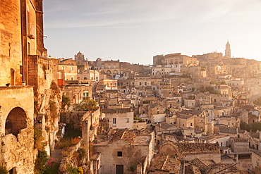 View over Sasso Caveoso to the cathedral at sunrise, UNESCO World Heritage Site, Matera, Basilicata, Puglia, Italy, Europe