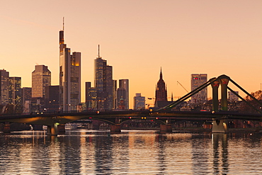 View over Main River to Floesserbruecke bridge and financial district, Frankfurt, Hesse, Germany, Europe