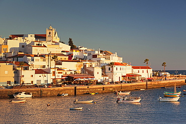 Ferragudo fishing village at sunset, near Portimao, Algarve, Portugal, Europe