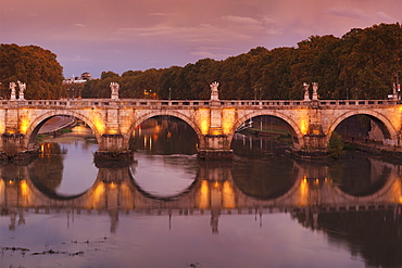 Ponte Sant'Angelo Bridge reflected in Tiber River at sunset, Rome, Lazio, Italy, Europe