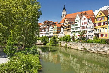 Old town with Stiftskirche church reflecting in Neckar river, Tubingen, Baden-Wurttemberg, Germany, Europe