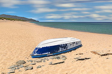 Upturned boat on Scivu beach, Arbus, Sud Sardegna district, Sardinia, Italy, Mediterranean, Europe