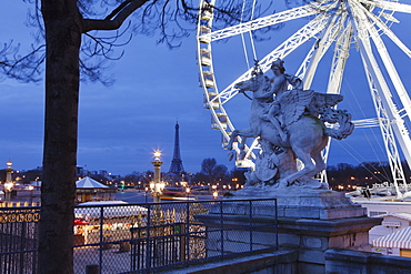 View from Place de la Concorde with big wheel and statue to the Eiffel Tower, Paris, Ile de France, France, Europe 