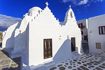 Whitewashed Panagia Paraportiani, Mykonos most famous church, under a blue sky, Mykonos Town (Chora), Mykonos, Cyclades, Greek Islands, Greece, Europe