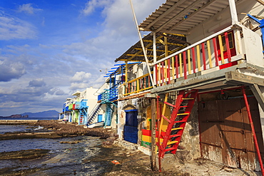 Syrmata, traditional fishermen's encampments with brightly painted woodwork, fishing village of Klima, Milos, Cyclades, Greek Islands, Greece, Europe