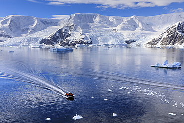 Early morning on a gorgeous day, elevated view of zodiac boat in Neko Harbour, Andvord Bay, Antarctic Continent, Antarctica, Polar Regions