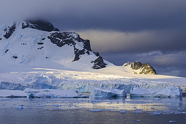 Early morning atmospheric cloud, mountains, glaciers and icebergs, Ronge Island, Errera Channel, Antarctic Peninsula, Antarctica, Polar Regions