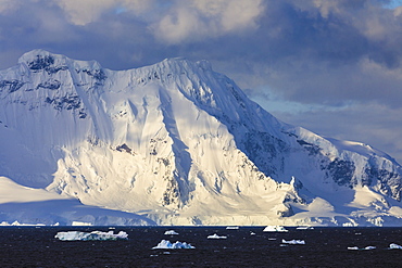 Gerlache Strait mountains, glaciers and icebergs, late evening before sunset, Antarctic Peninsula, Antarctica, Polar Regions