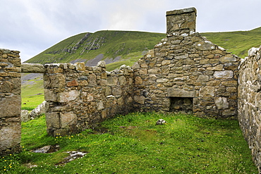 Stone remains of evacuated cottage with fireplace, Hirta, remote St. Kilda Archipelago, UNESCO World Heritage Site, Outer Hebrides, Scotland, United Kingdom, Europe