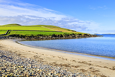 Beautiful Sandwick beach, green hills and cliffs of Ness of Hillswick, Northmavine, Shetland Isles, Scotland, United Kingdom, Europe