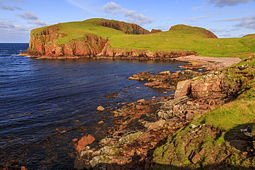 North Ham Bay, deep inlet, lichen covered huge red granite cliffs, Muckle Roe Island, Shetland Isles, Scotland, United Kingdom, Europe