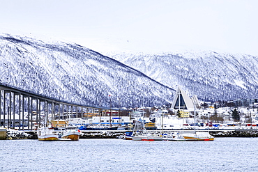 Tromso, small boat harbour, fjord, bridge, Arctic Cathedral, deep snow in winter, Tromso, Troms og Finnmark, Arctic Circle, North Norway, Scandinavia, Europe