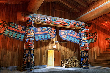 Carved totems, The Big House, Klemtu, First Nations Kitasoo Xai Xais community, Great Bear Rainforest, British Columbia, Canada, North America