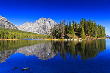 Reflections in Leigh Lake, Grand Teton National Park, Wyoming, United States of America, North America