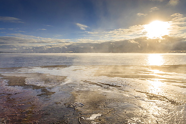 Freezing dawn mists, Yellowstone Lake at West Thumb Geyser Basin, Yellowstone National Park, UNESCO World Heritage Site, Wyoming, United States of America, North America