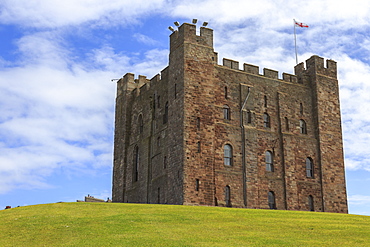 Bamburgh Castle, The Keep, with English flag of St. George, Bamburgh, Northumberland, England, United Kingdom, Europe