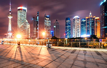 Cityscape Shanghai Lujiazui with Oriental Pearl Tower, skyscrapers and bright lights at night, Shanghai, China, Asia