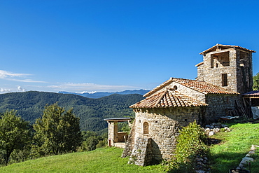 Sant Marti de Toralles Norman church and the Garrotxa Volcanic Zone Natural Park, Pyrenees, Catalonia, Spain, Europe