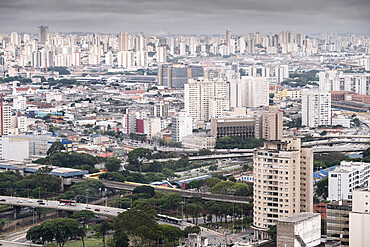 Elevated view of urban highways, Avenida do Estado and Diario Popular bridge, downtown and concrete buildings, Sao Paulo, Brazil, South America