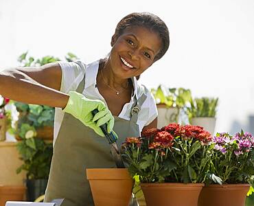 Senior African American woman gardening