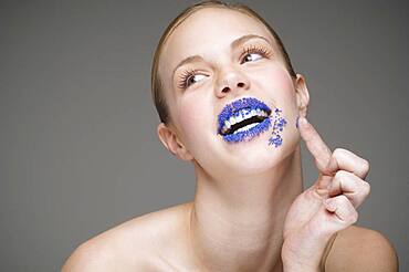 Woman with sprinkles on lips