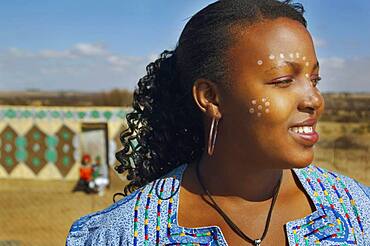 African woman with paint on face