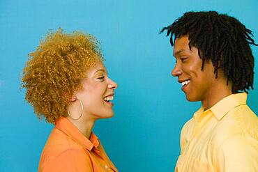 African couple smiling at each other