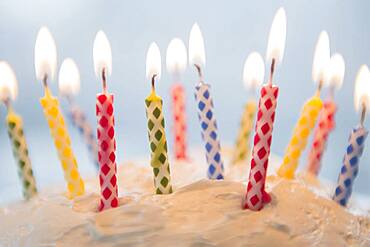 Close up of birthday candles in cake