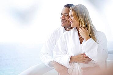 Couple hugging on balcony